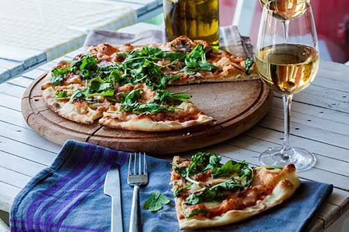 Uncle Dave's Pizzeria - We deliver in the Greater Vernon and Coldstream areas. Call us now for the best pizza in town! (250) 558-4228
